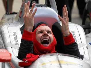 MAGIC MOMENT: Toowoomba's Will Power celebrates winning his first ever Indianapolis 500 at the Indianapolis Motor Speedway. Picture: Chris Graythen