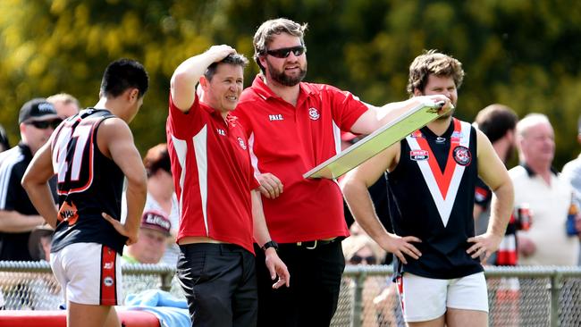 Para Hills 2015 premiership coach and former AFL player Scott Bamford, second from left, is back on the park as the club rebuilds after a season in the wilderness. Pictures: Sam Wundke