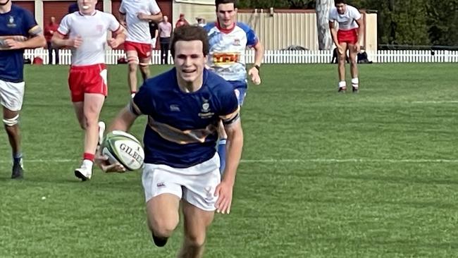 Churchie's Archie Wilson on the way to scoring.