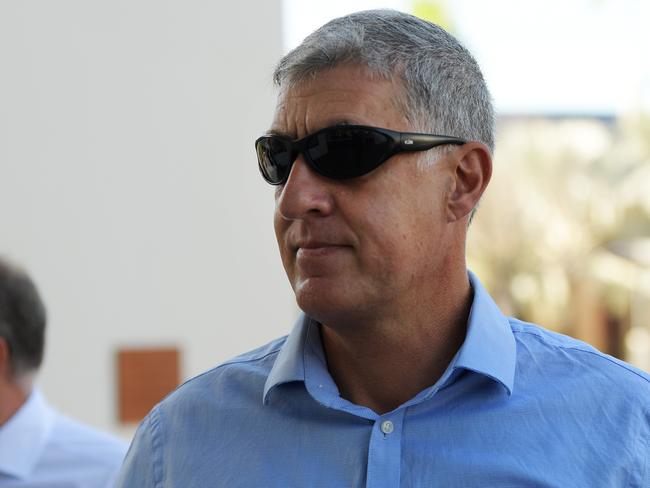 NT Police Assistant Commissioner Peter Bravos arrives at Darwin Local Court ahead of his committal on four counts of rape, Thursday, June 13, 2019. Picture: KERI MEGELUS