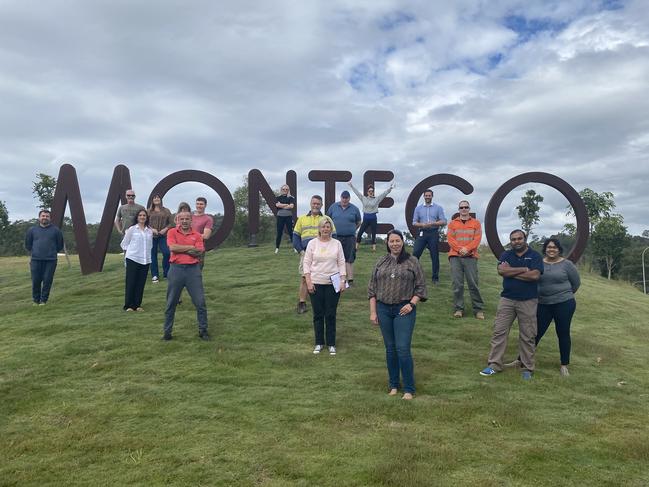 Montego Hills residents at their estate's beloved landmark.