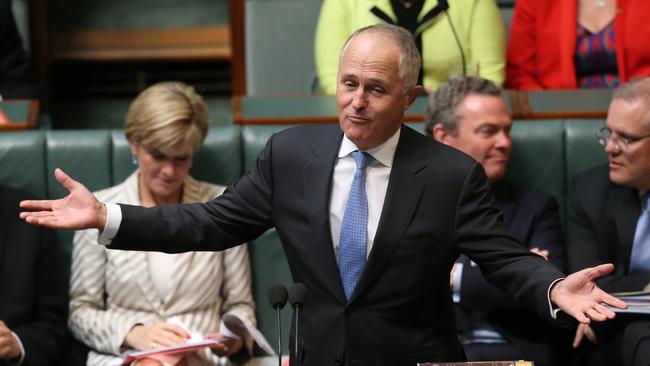 Day job ... Communications Minister in action in responds during Question Time.