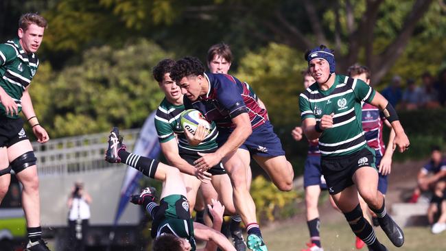 Jojo Fifita of TSS runs with the ball against BBC during their GPS Rugby clash. Photograph : Jason O'Brien