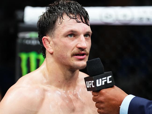 PERTH, AUSTRALIA - AUGUST 18: Jack Jenkins of Australia reacts after a TKO victory against Herbert Burns of Brazil in a featherweight fight during the UFC 305 event at RAC Arena on August 18, 2024 in Perth, Australia. (Photo by Jeff Bottari/Zuffa LLC)