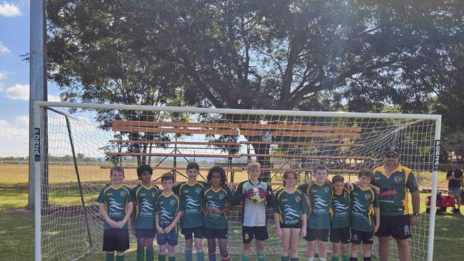 Boogan Stars under-10/11 players (from left) Liam Franks, Nanakroop Singh, Benson Lizzio, Ethan Goodwin, Mahutamana Tutavake, Noah Pensini, Bree-Ann Blennerhassett, Sam Costello, Kody D’Urso, Blake Baker and coach Erik D’Urso celebrate being named MiniRoos Team of the Week.