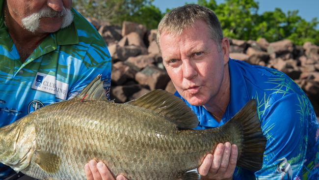 Major Events Minister Paul Kirby holding the tagged million dollar barramundi as he officially open season nine of the Million Dollar Fish competition. Picture: Pema Tamang Pakhrin