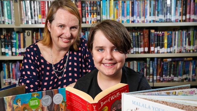 Spensley Street Primary School teacher Georgia Vabre with student Joe, 9. Picture: Ian Currie