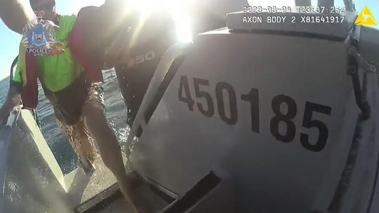 A police bodycam has caught the hilarious moment four fishermen were rescued from sea after their boat capsized. Picture: WA Police