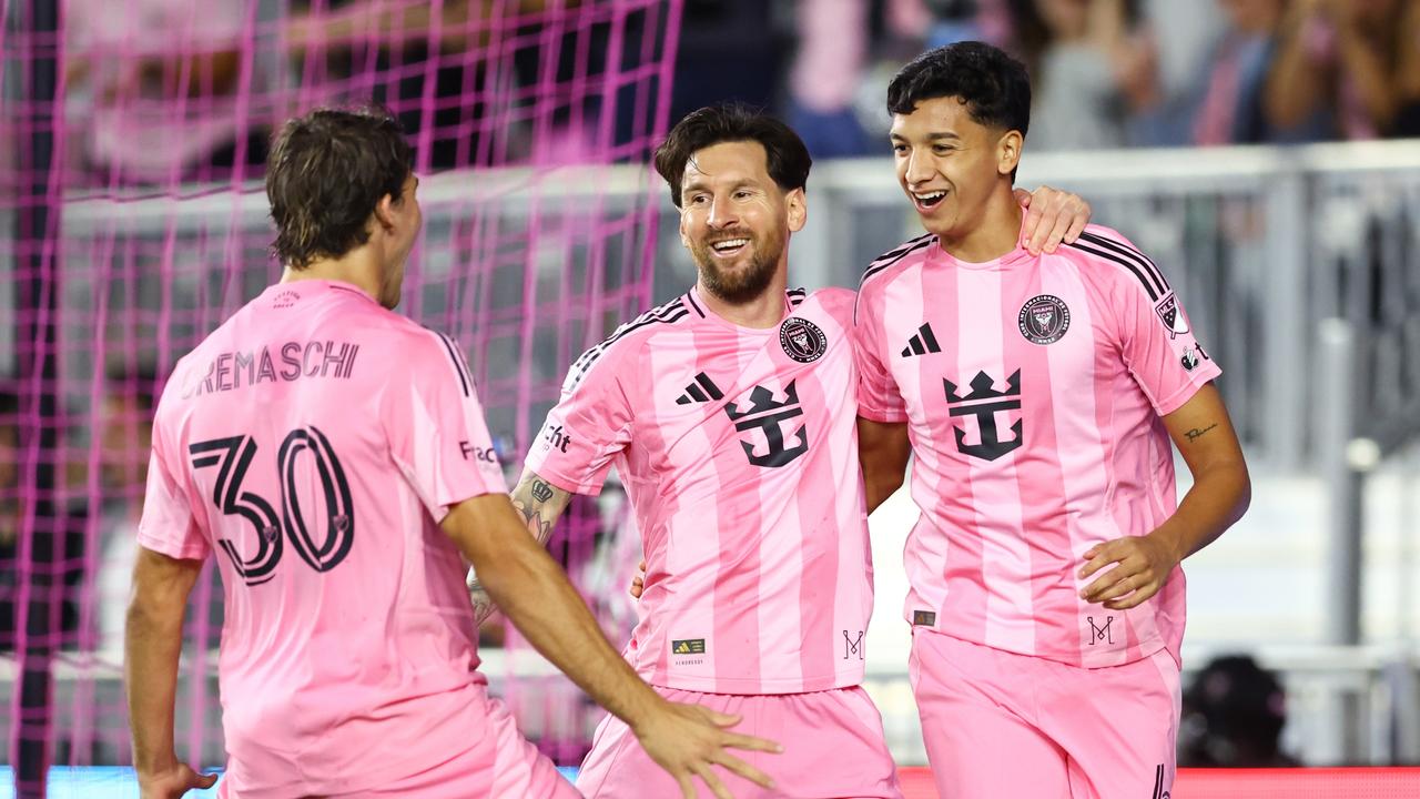 Lionel Messi (centre) celebrates teammate Tomas Aviles’ (right) opening goal. (Photo by Megan Briggs/Getty Images)