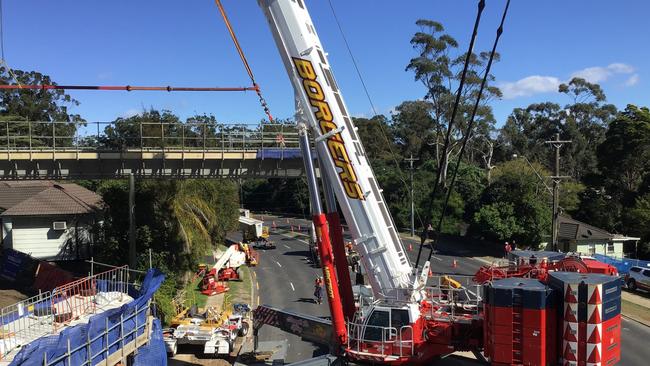 A 750,000kg crane installs girders at Kissing Point Road bridge in Dundas for the Parramatta Light Rail project.