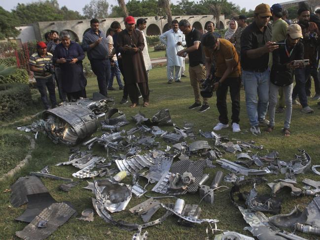 Metal pieces of Indian missiles lie on the compound of a mosque building damaged by an Indian missile attack, near Bahawalpur, in Pakistan. Picture: AP