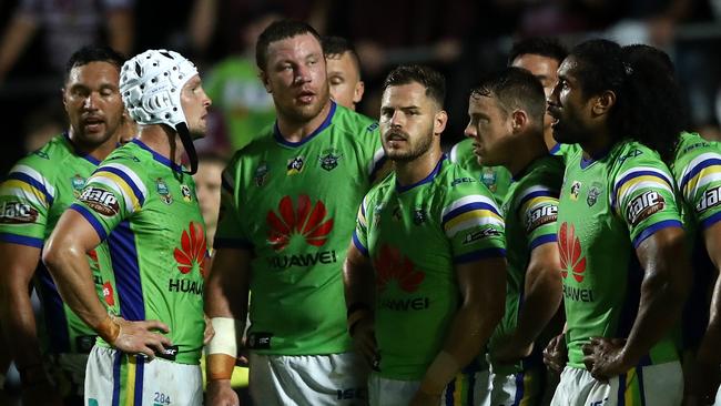 Raiders players look dejected during their loss to the Sea Eagles.