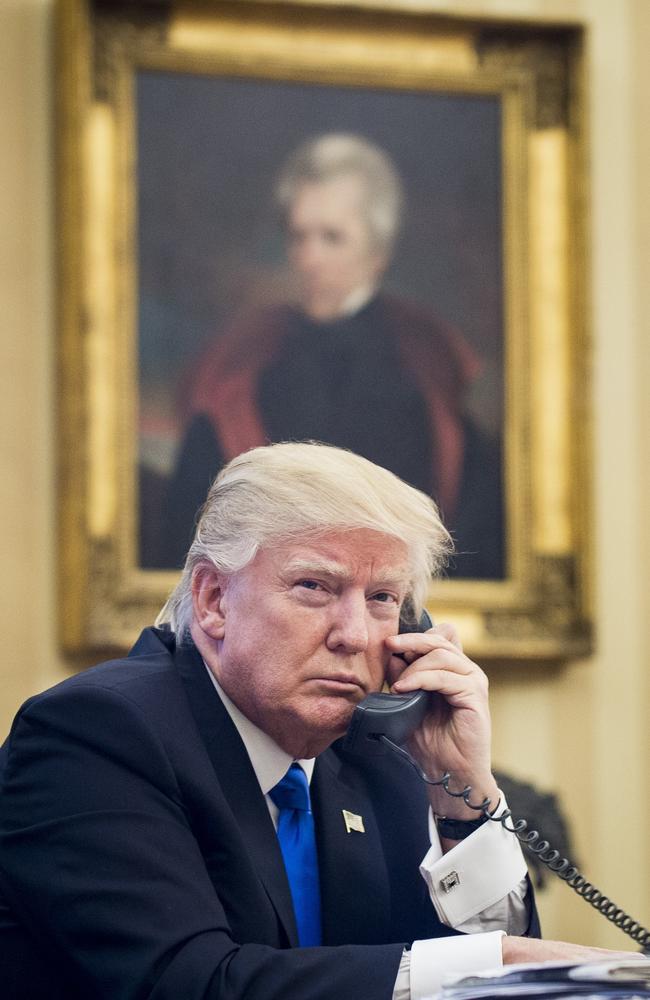 Donald Trump speaking on the phone with Malcolm Turnbull in the Oval Office. Picture: Pete Marovich/Consolidated News Photos