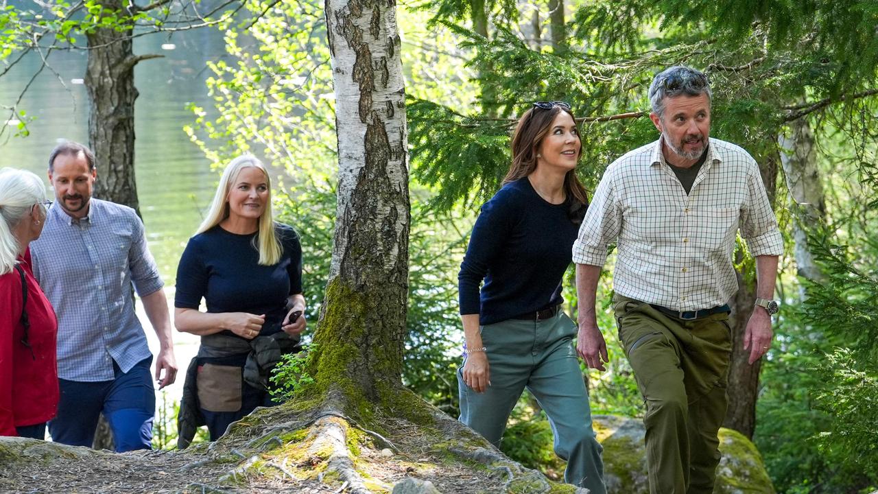 King Frederik X of Denmark (R), Queen Mary of Denmark (2ndR), Crown Princess Mette-Marit of Norway (3rdL) and Crown Prince Haakon of Norway (2ndL) walk around the Ulsrudvann lake in Ostmarka by Oslo, Norway. Picture: AFP