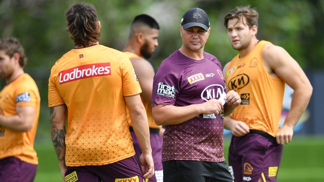 Broncos coach Anthony Seibold (centre) is seen during Brisbane Broncos training session at Clive Berghofer Field in Brisbane, Wednesday, March 11, 2020. The Broncos are playing the North Queensland Cowboys in their round 1 NRL match. (AAP Image/Darren England) NO ARCHIVING