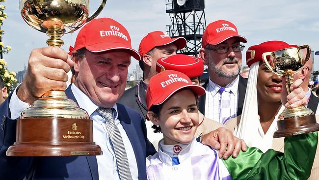 Darren Weir celebrating Prince of Penzance’s Melbourne Cup win with Michelle Payne in 2015. Picture: AP