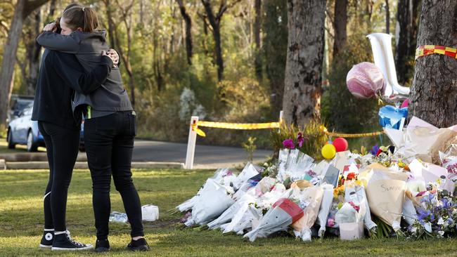 People at the crash site in Buxton where five friends from Picton High School died in a single-vehicle car crash on Tuesday night. Picture: Jonathan Ng