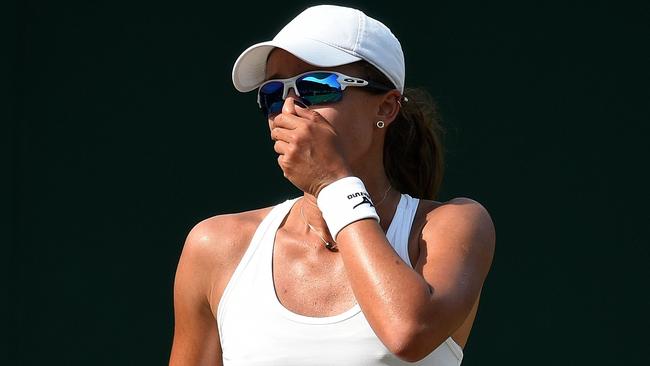 Australia's Arina Rodionova reacts against Kazakhstan's Zarina Diyas.