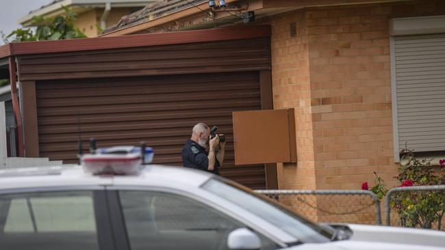 Police investigators at the Essex St, Woodville Gardens, home. Picture: RoyVPhotography