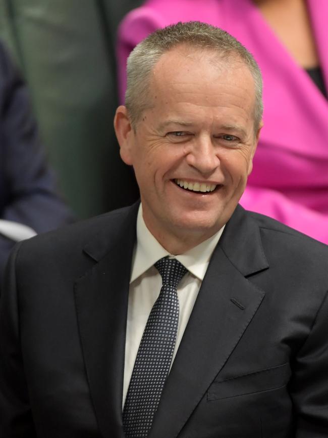 Mr Shorten laughs off banter from the federal government during Question Time in the House of Representatives at Parliament House on Monday. Picture: Getty