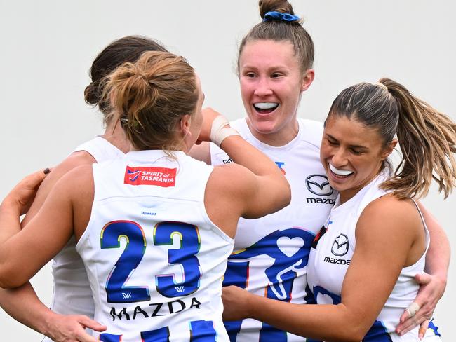 HOBART, AUSTRALIA - OCTOBER 13: Tahlia Randall of the Kangaroos celebrates a goal  during the round seven AFLW match between North Melbourne Kangaroos and Sydney Swans at North Hobart Oval, on October 13, 2024, in Hobart, Australia. (Photo by Steve Bell/AFL Photos/via Getty Images)