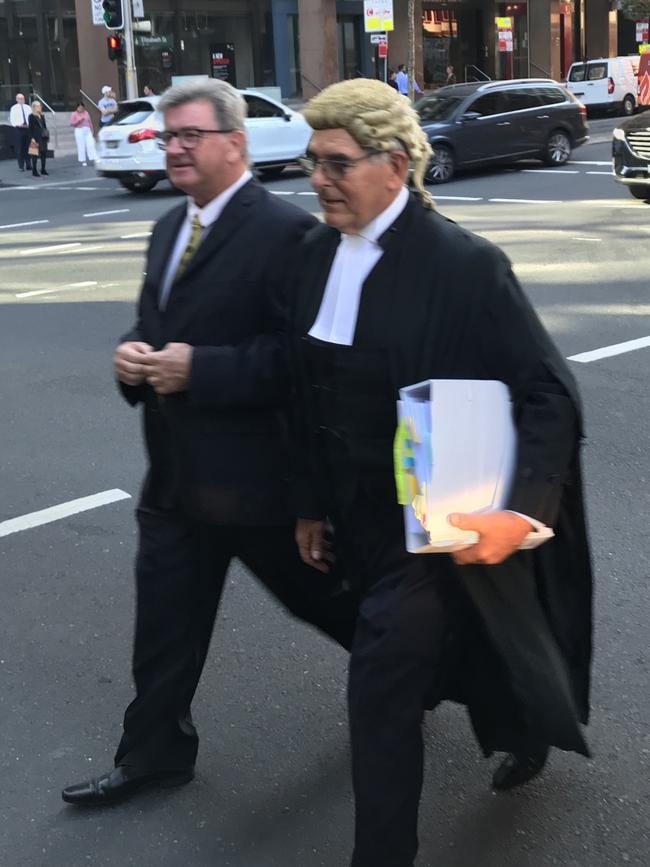 Barrister Clive Steirn SC arrives at the NSW Supreme Court with veteran TV journalist Steve Barrett. Picture: Natalie O'Brien