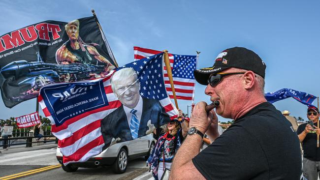 Trump supporters gather near Mar-A-Lago. Picture: AFP.