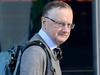 ‘Quit’: RBA boss under pressure over rate hike
