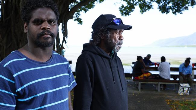 Leroy Liddy has travelled from Coen to Cairns for court matters, and Roderick Doctor from Lockhart River for family reasons. Both men have strong ties to Country and would like to return to their communities but are unable to. Picture: Brendan Radke