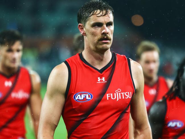 ADELAIDE, AUSTRALIA - SEPTEMBER 12: Joe Daniher of the Bombers walks from the ground during the round 17 AFL match between the Port Adelaide Power and the Essendon Bombers at Adelaide Oval on September 12, 2020 in Adelaide, Australia. (Photo by Daniel Kalisz/Getty Images)