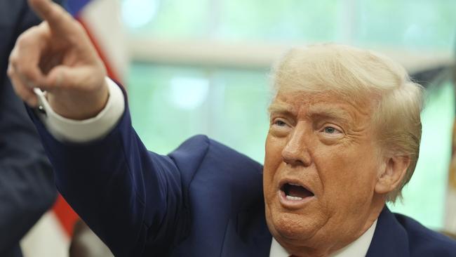 Donald Trump’s trade deal with the UK represents a further retreat from the global trading system. Picture: AP