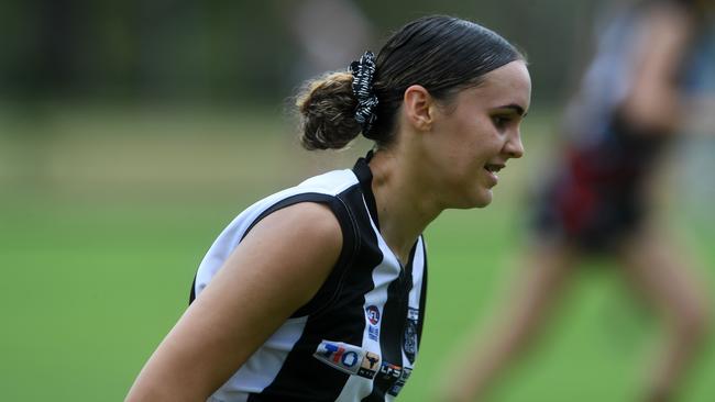 Tsharni Graham runs down the field in the first game of the women's NTFL 22/23 season. Picture: (A)manda Parkinson