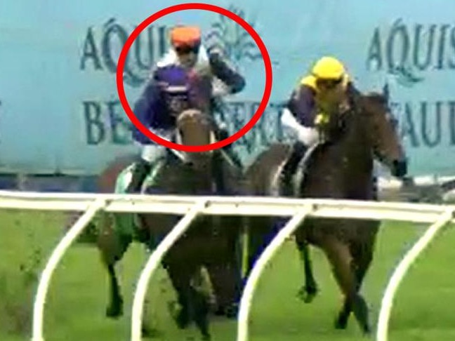 Quade (Jag Guthman-Chester, circled) was elevated from second to first after stewards deemed he was tightened by Beachside Babe (Andrew Spinks, yellow cap) at the 300m. Picture: Screengrab / Racing Queensland