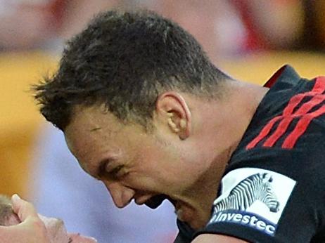 BRISBANE, AUSTRALIA - MAY 11: Johnny McNicholl of the Crusaders celebrates with team mate Israel Dagg after scoring a try during the round 13 Super Rugby match between the Reds and the Crusaders at Suncorp Stadium on May 11, 2014 in Brisbane, Australia. (Photo by Bradley Kanaris/Getty Images)