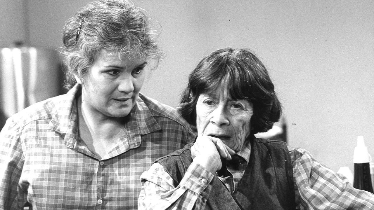 Sheila Florance (right) in character as Lizzie Birdsworth in the television show Prisoner, with her co-star Betty Bobbitt. Florance attended Presentation College before leaving school at the age of 15 to pursue acting.