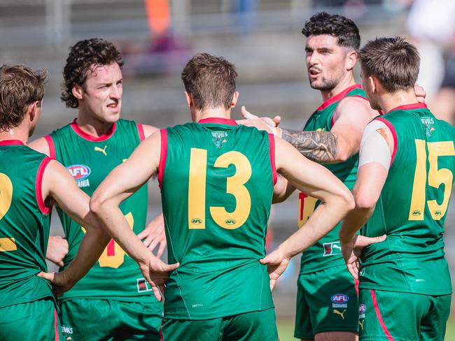 Tasmanian defender Harrison Gunther talks to fellow backmen in the state game against Frankston at North Hobart Oval. Picture Linda Higginson Solstice Digital