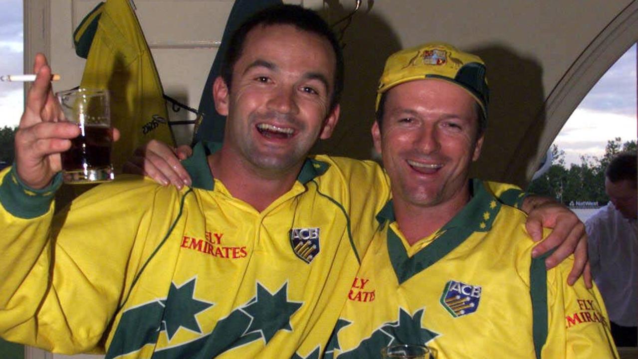 Steve Waugh and Adam Dale enjoy a drink after winning the World Cup.