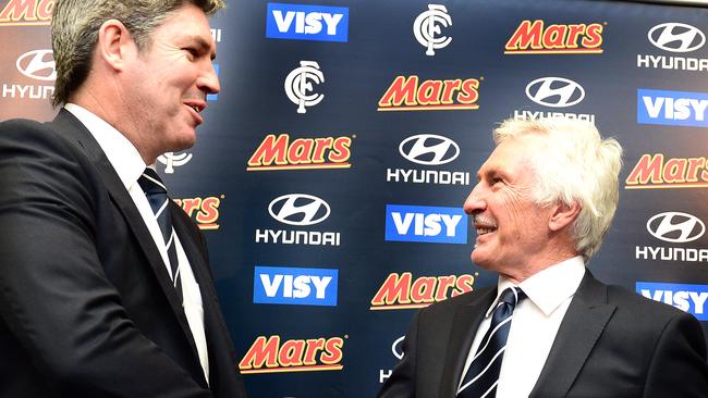 Then-Carlton president Stephen Kernahan welcomes Mick Malthouse to the Blues.