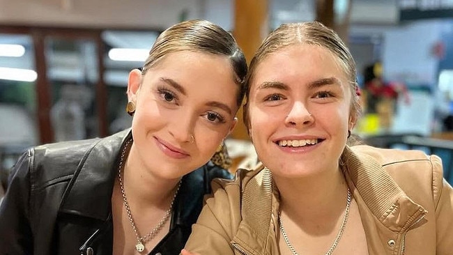 Lacie (right) with her older sister Mikah.
