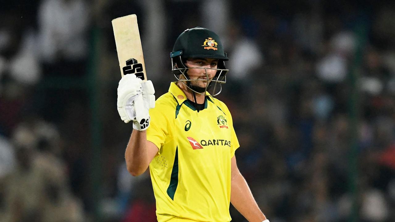 Australia's Tim David celebrates after scoring a half-century (50 runs) during the third Twenty20 international cricket match between India and Australia at the Rajiv Gandhi International Cricket Stadium in Hyderabad on September 25, 2022. (Photo by NOAH SEELAM / AFP) / ----IMAGE RESTRICTED TO EDITORIAL USE - STRICTLY NO COMMERCIAL USE-----