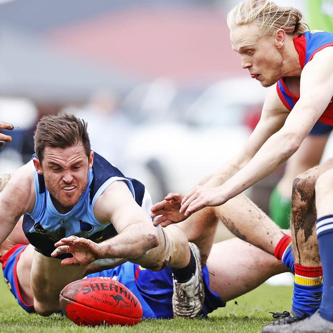 Lindisfarne's Kieren Rogers and Huonville's Dylan Hay compete for the ball. Picture: Zak Simmonds