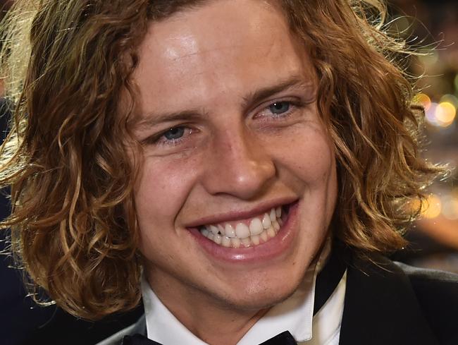 Fremantle Dockers player Nat Fyfe reacts after winning the Brownlow Medal at Crown in Melbourne, Monday, Sept. 29, 2015. The Brownlow medal is awarded to the best and fairest AFL player in the home and away season. (AAP Image/Julian Smith) NO ARCHIVING