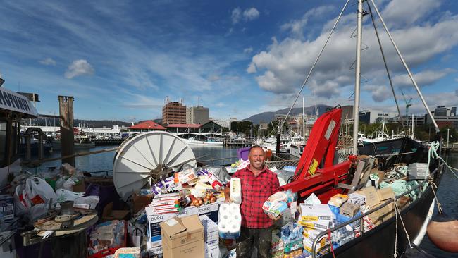 Bryan Denny with the boat load of supplies he delivered to Dover to help those who are remaining around bushfire affected areas in the Huon Valley. Picture: NIKKI DAVIS-JONES