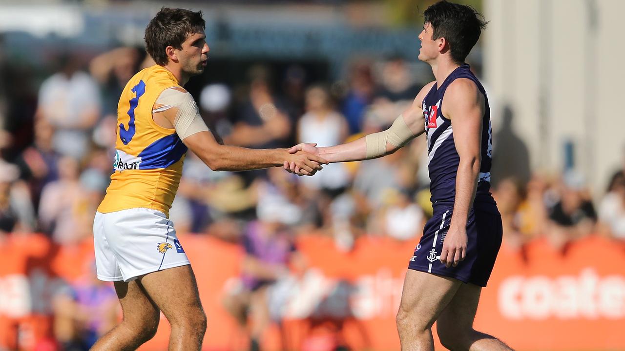 Andrew Brayshaw and Andrew Gaff shake hands before their JLT clash. Picture: Getty Images 