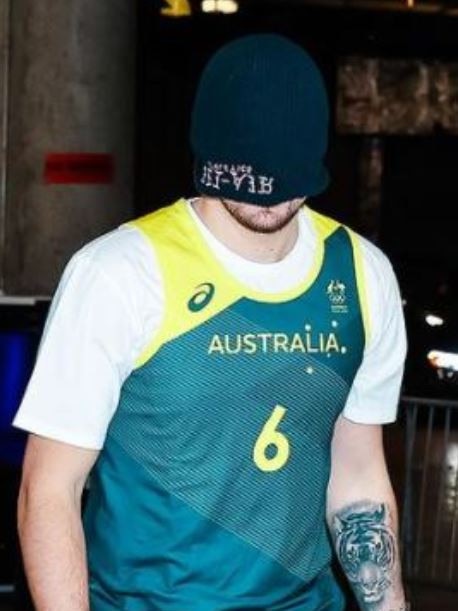 The famous image of Luka Doncic in Josh Green's Boomers jersey.