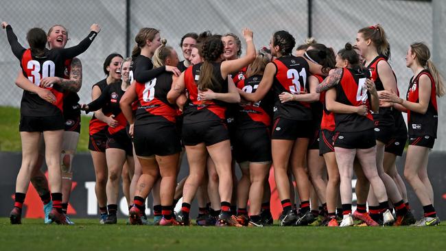 NFL: Eltham players celebrate after the siren of the NFL Division 2 women’s grand final. Picture: Andy Brownbill