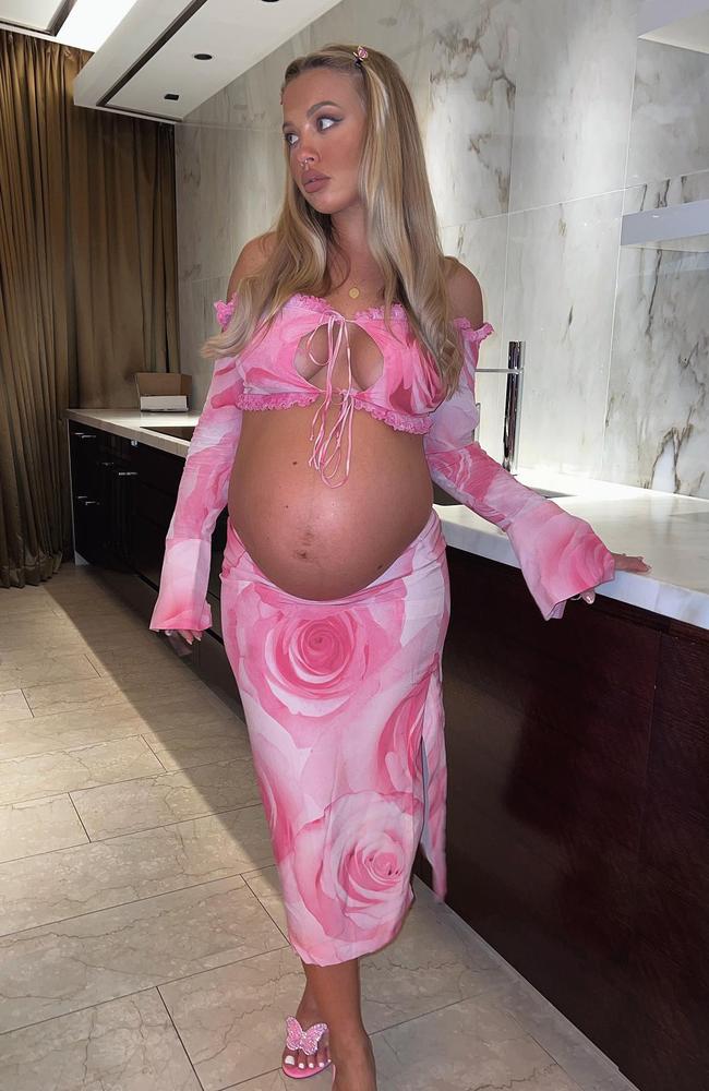 Tammy Hembrow, 27, rocked a two-piece pink outfit flaunting her baby bump. Picture: Instagram/TammyHembrow