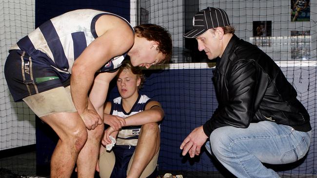 Gary Sr (right) with Gary Jr and Nathan after a Geelong game.