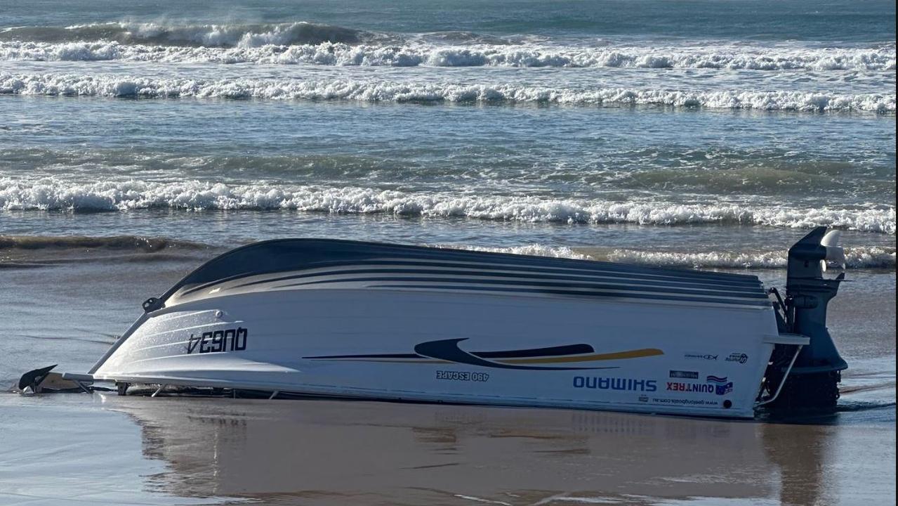 The boat capsized reportedly after it was swamped by a wave at Barwon Heads. Picture: Supplied/Twitter/Shaun Reardon.