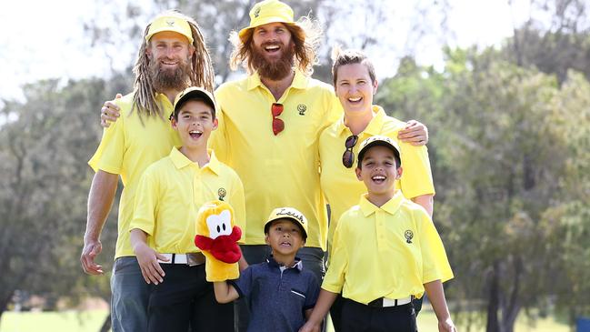 PGA GOLD COAST DAY THREE - L to R, golfer Jack Wilson, caddie Rizz O'Neill, Briony Lyle, in the Yellow Day mood to honour her late husband Jarrod Lyle on Friday at the Australian PGA - Photo: Jono Searle, PGA